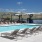 a pool with chairs around it