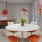 a room with a table and chairs