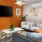 a living room with a tv and couches